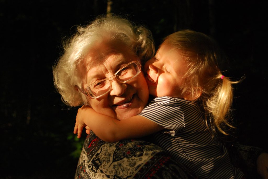 granny hugging child