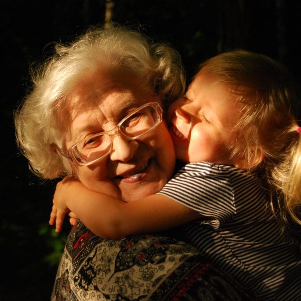 granny hugging child